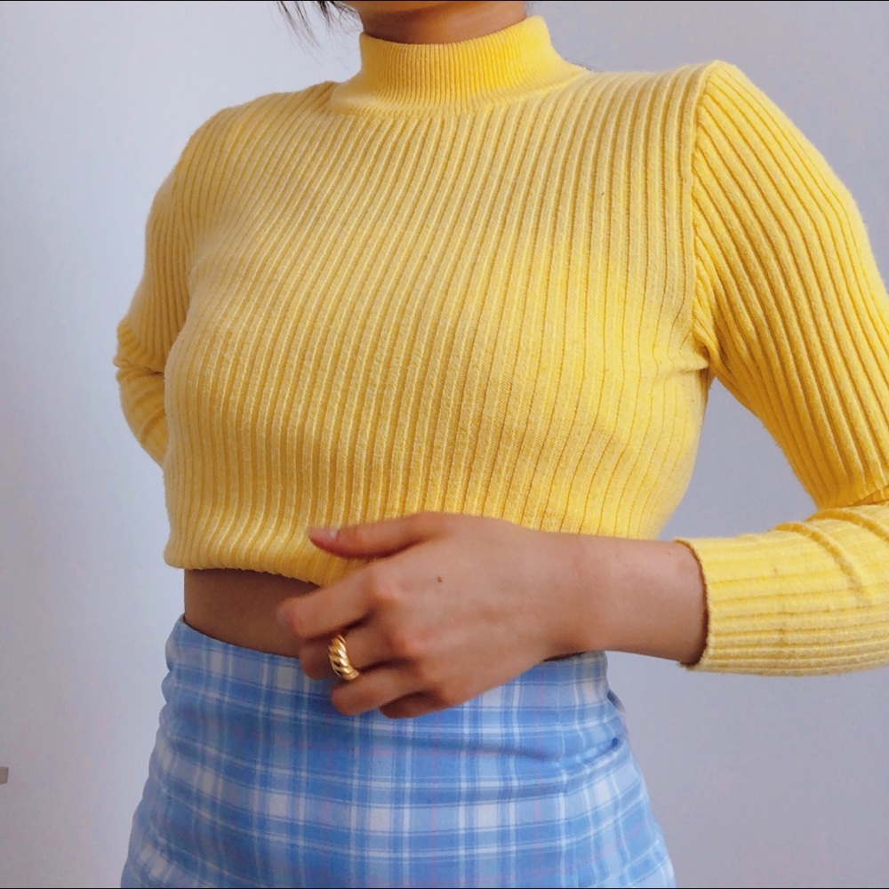 Yellow turtleneck sweater